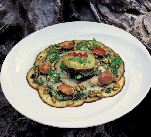 Cep Carpaccio is a carpaccio of confit Ceps and potato salad, black truffle and lamb's lettuce with rabbit kidneys. Cep Carpaccio is a carpaccio of confit Ceps and potato salad, black truffle and lamb's lettuce with rabbit kidneys.