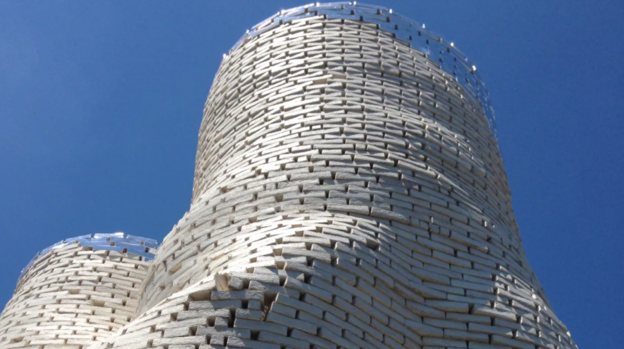 Towers built with mycelium bricks.